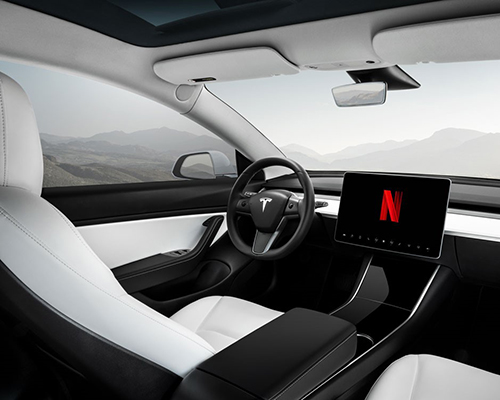 tesla to enable in-car netflix and youtube video streaming 'soon'