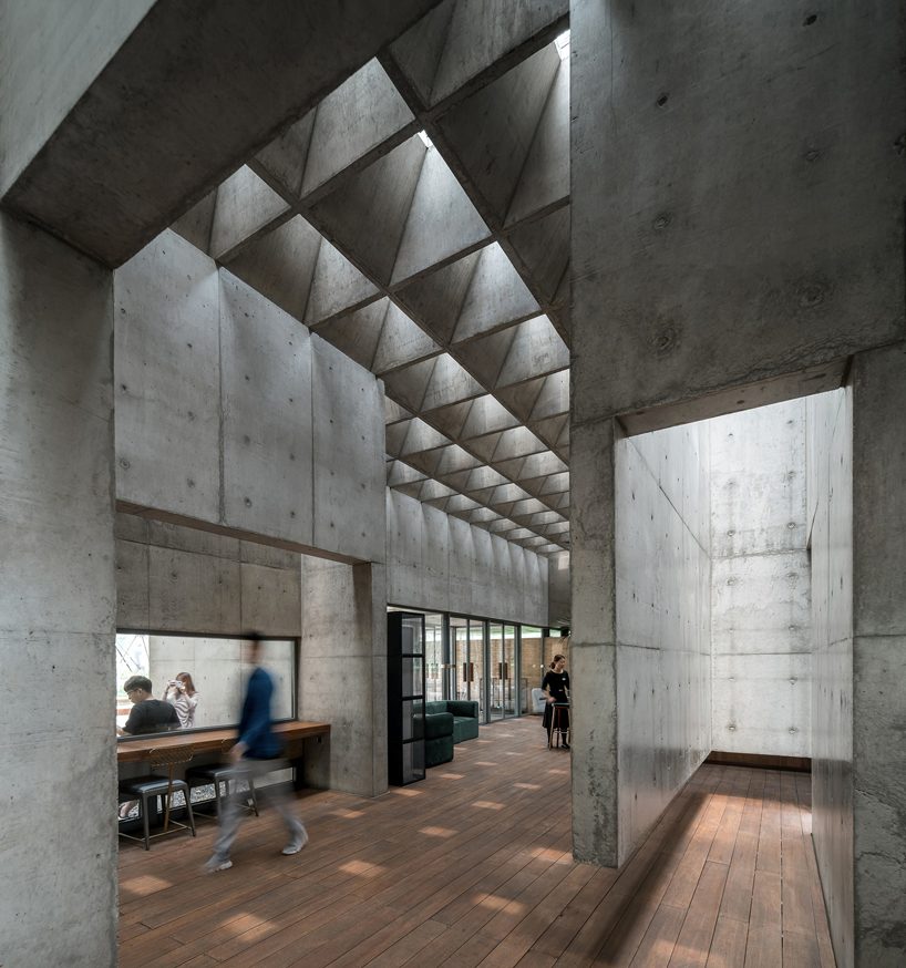 concrete waffle beams bring natural light into vector architects' restaurant in china designboom