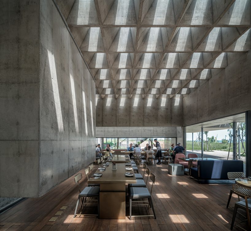 concrete waffle beams bring natural light into vector architects' restaurant in china designboom