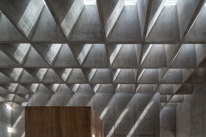 concrete waffle beams bring natural light into vector architects' restaurant in china designboom