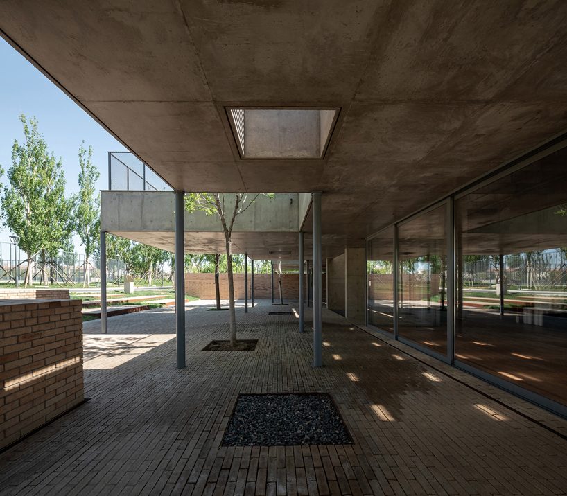 concrete waffle beams bring natural light into vector architects' restaurant in china designboom