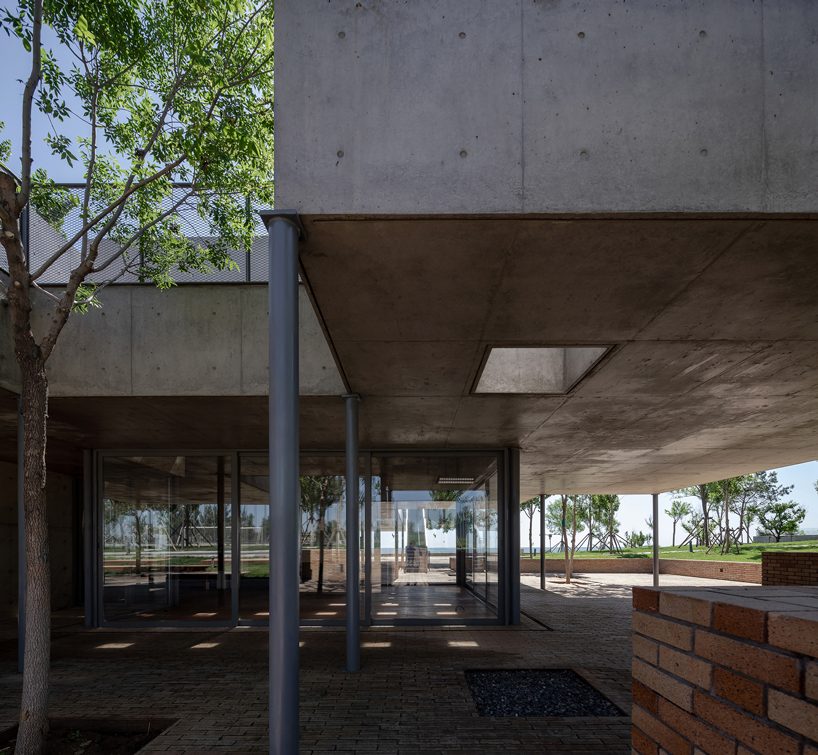 concrete waffle beams bring natural light into vector architects' restaurant in china designboom