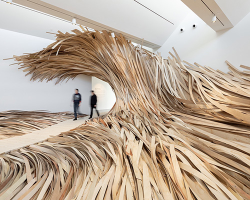 wade kavanaugh + stephen b. nguyen install immersive tidal wave of wood at CMCA
