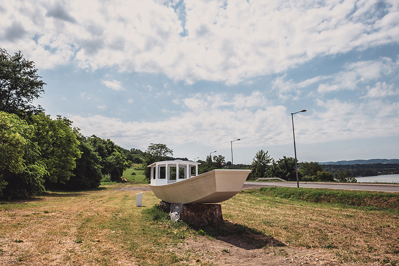 yoko ono alters traditional serbian riverboat to commemorate the end of WWI designboom