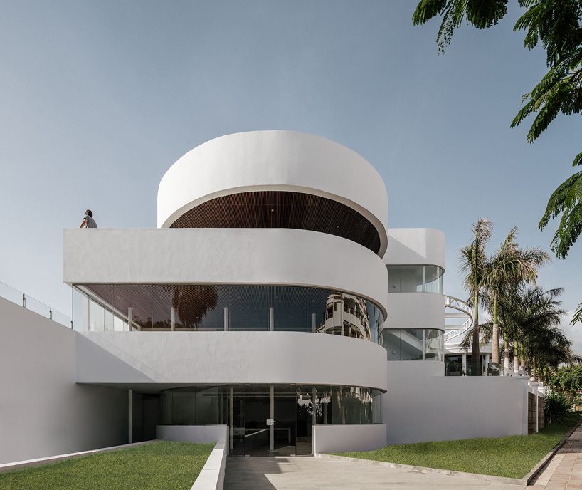 zooco estudio's flamingo club hotel in tenerife combines bamboo, basalt stone + white hues