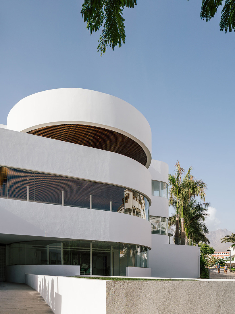 zooco estudio's flamingo club hotel in tenerife combines bamboo, basalt stone + white hues