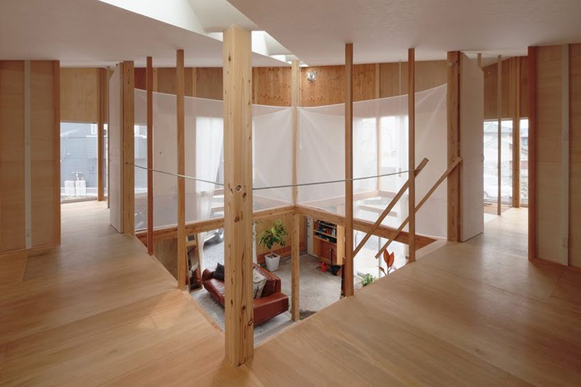  ikimono architects divides areas of this japanese house using a wooden grid