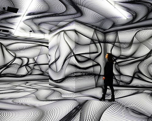 peter kogler transforms rooms with hypnotic installations featuring optical illusions
