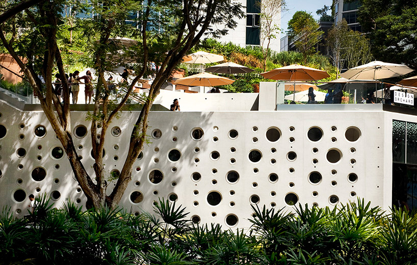 woha tops singapore's design orchard with a luscious green rooftop