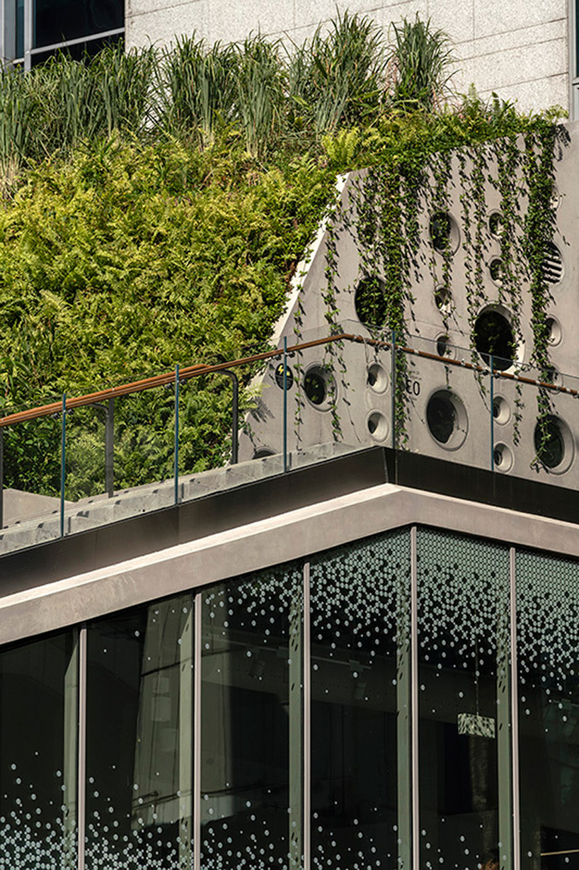 woha tops singapore's design orchard with a luscious green rooftop
