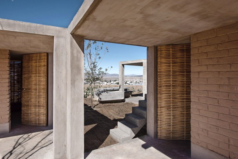 zeller & moye connects box-like volumes to form sustainable housing in rural mexico designboom