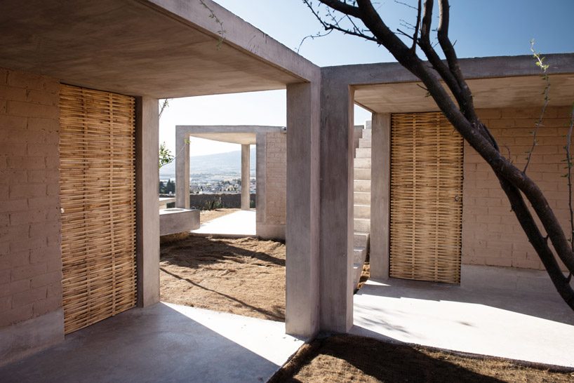 zeller & moye connects box-like volumes to form sustainable housing in rural mexico designboom