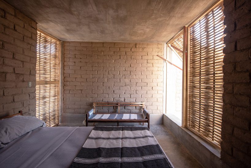 zeller & moye connects box-like volumes to form sustainable housing in rural mexico designboom