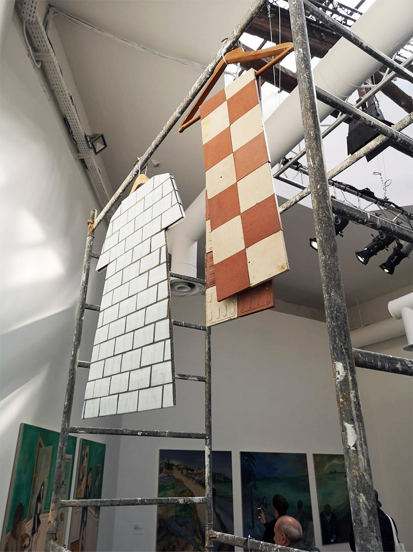 zhanna kadyrova repurposes ceramic tiles into garments in second hand project