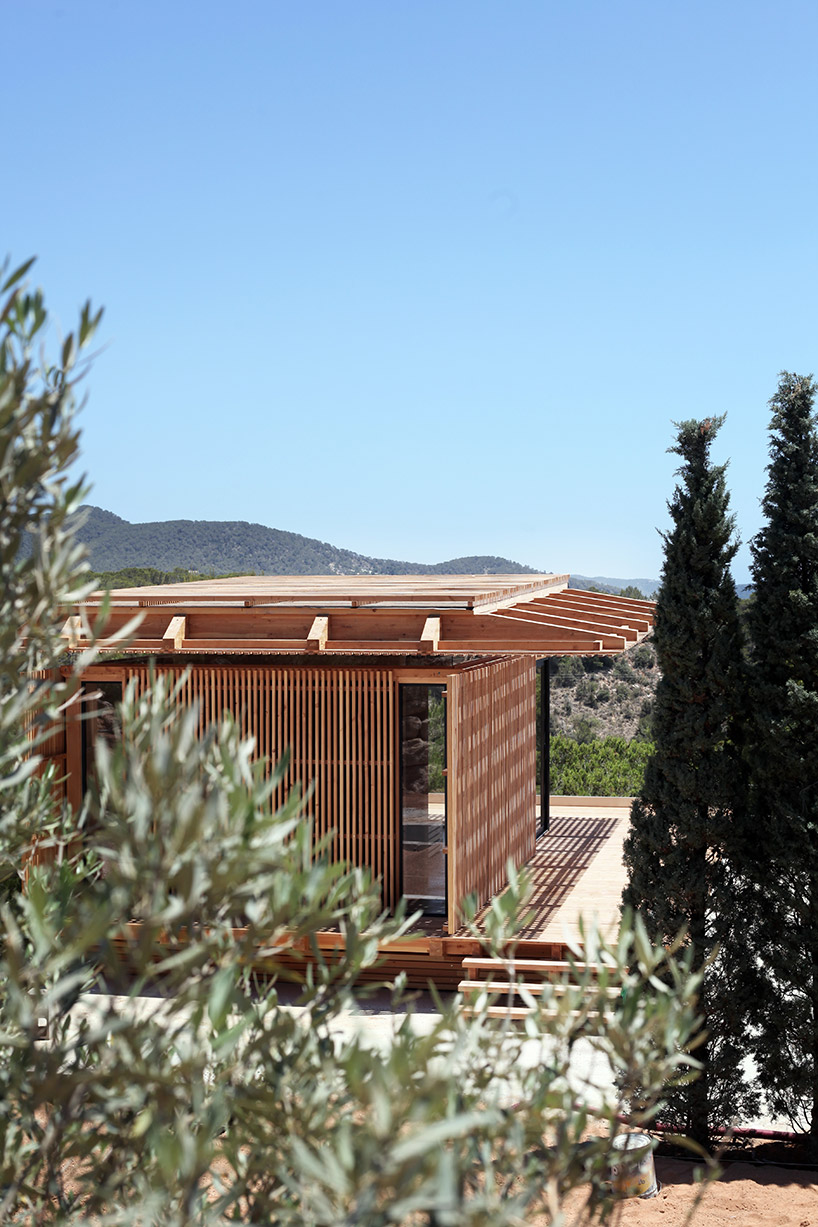 atelier lavit nestles private timber room in the bushes of ibiza's west coast