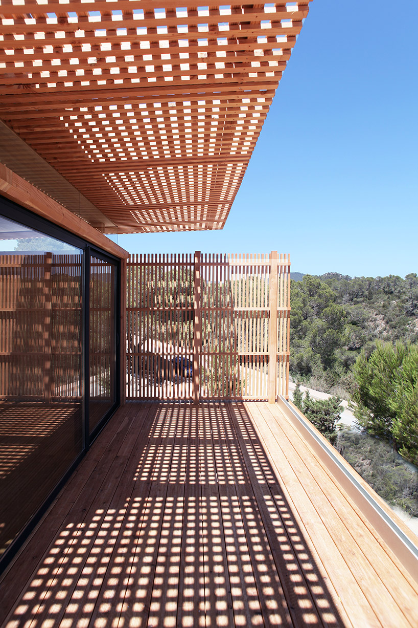atelier lavit nestles private timber room in the bushes of ibiza's west coast