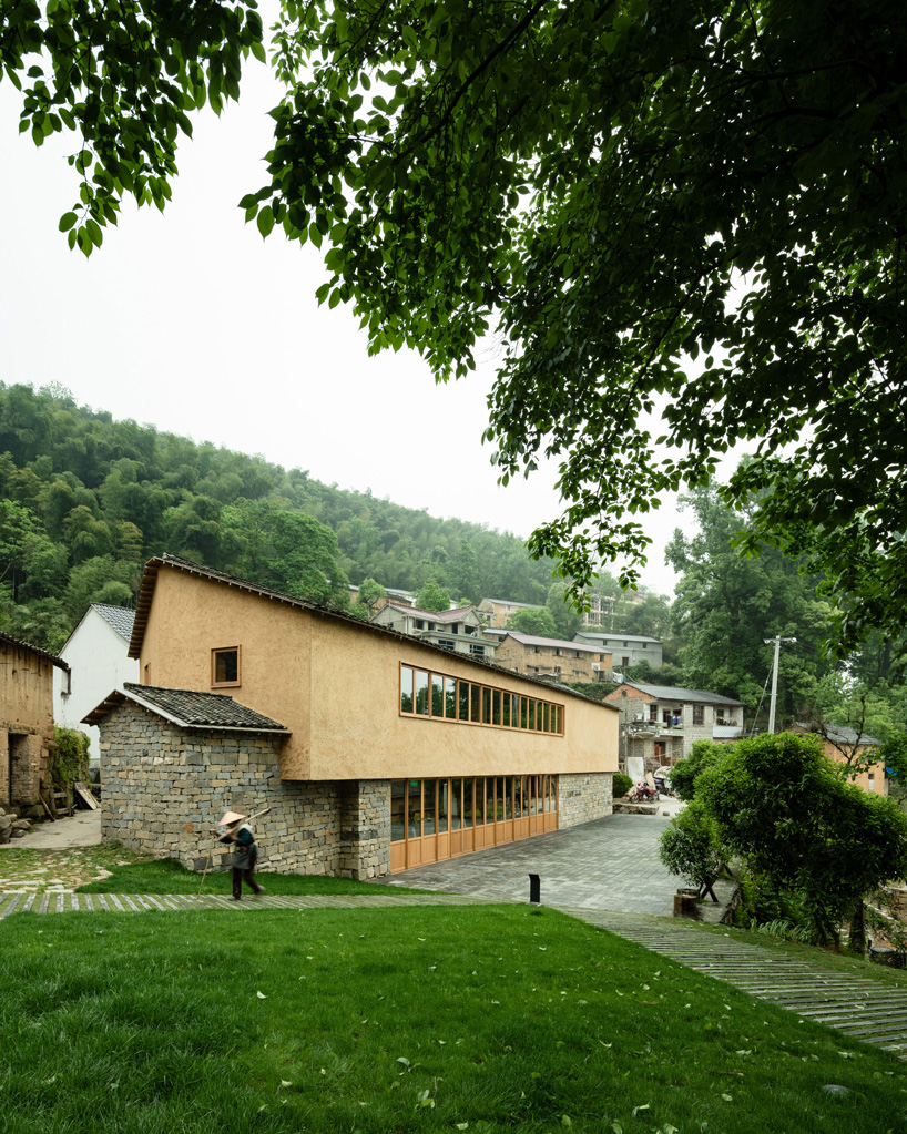 kooo architects rebuilds 'origin villa' hotel in rural china using bamboo, stone + charred wood