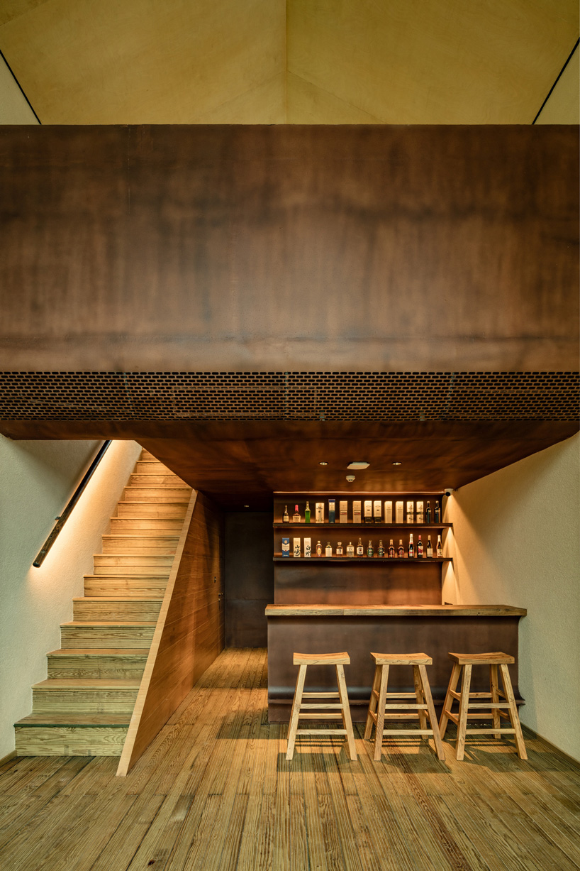 kooo architects rebuilds 'origin villa' hotel in rural china using bamboo, stone + charred wood