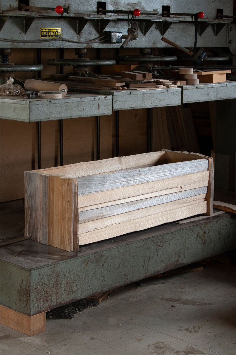 max lamb applies 9,000-year-old japanese lacquer technique to roughly hewn furniture