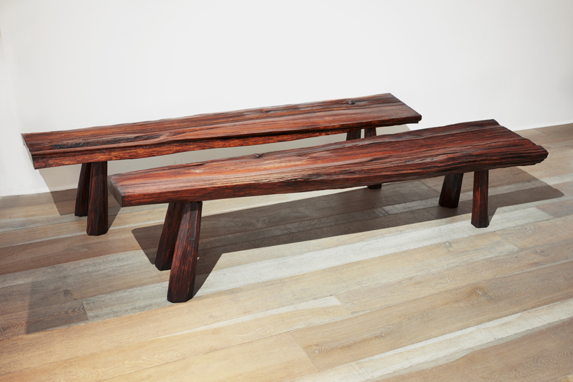 max lamb applies 9,000-year-old japanese lacquer technique to roughly hewn furniture