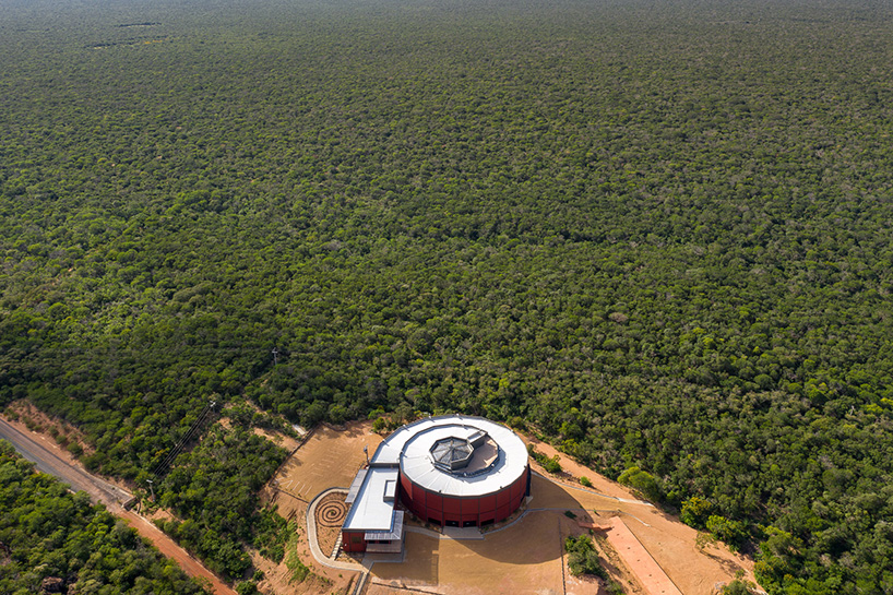 the spiral-shaped 'museu da natureza' is set amid brazil's natural landscape - 1