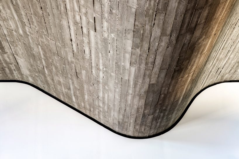 SAOTA's saint tropez summer house features an undulating timber ceiling designboom