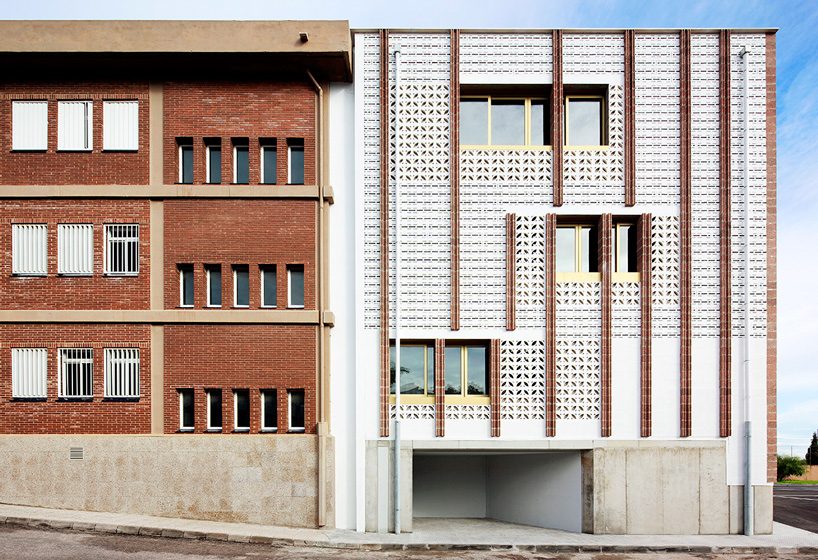SMS arquitectos wraps high school extension with patterned façade in mallorca