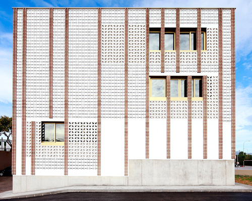 SMS arquitectos wraps high school extension with patterned façade in mallorca