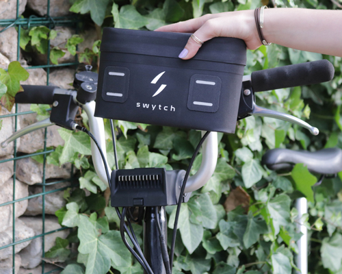 hand-held 'swytch kit' turns regular bikes into electric