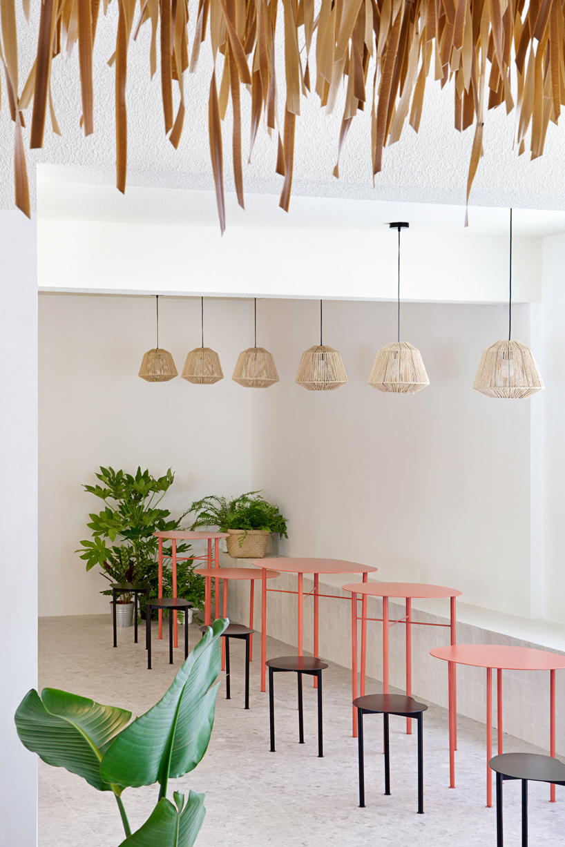 trtm architects converts warehouse into 'paradise club' on coast of alicante