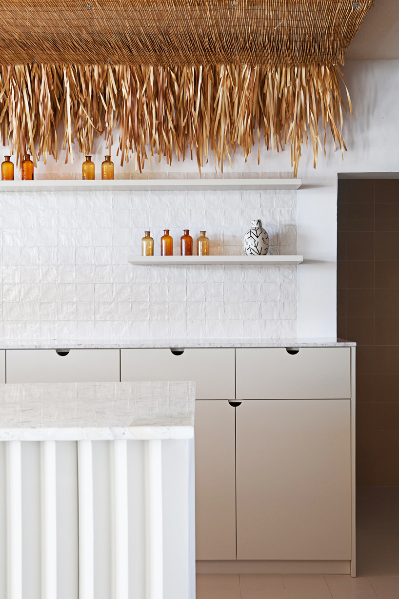 trtm architects converts warehouse into 'paradise club' on coast of alicante