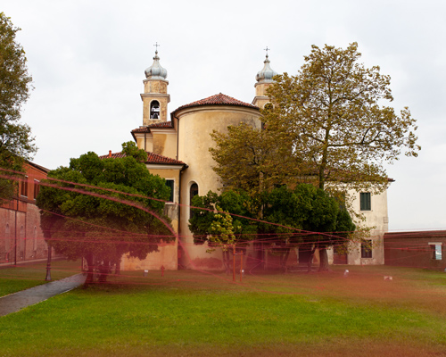 uemon ikeda conveys the fragile and vulnerable beauty of venice with delicate red thread