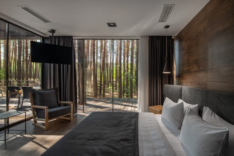 YOD group builds timber cabin with panoramic windows in ukrainian forest designboom
