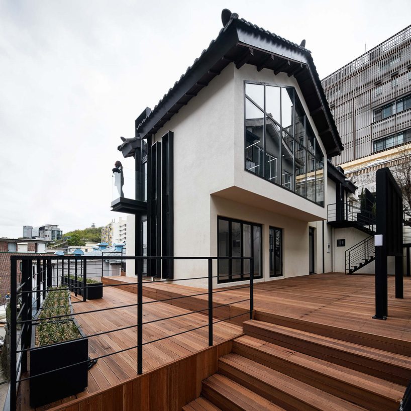 yong ju lee transforms 1930s wooden house into the hoehyeon community building in seoul