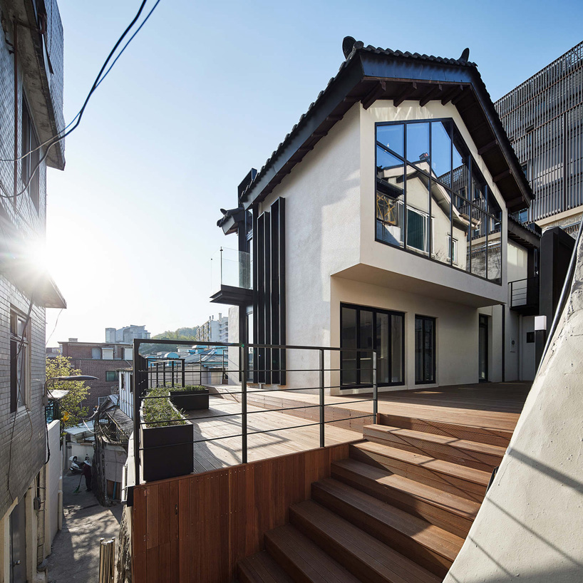 yong ju lee transforms 1930s wooden house into the hoehyeon community building in seoul