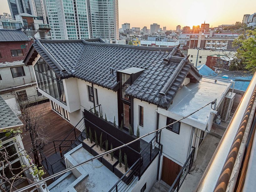 yong ju lee transforms 1930s wooden house into the hoehyeon community building in seoul