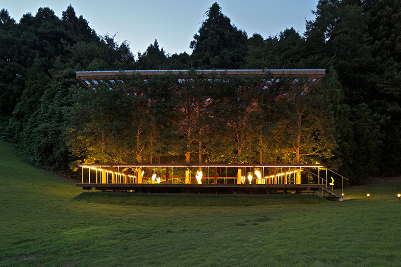 this timber structure in japan disappears against its forested backdrop - 3