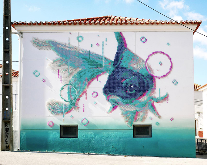 cross-stitch street art: portuguese artist combines digital and analog design