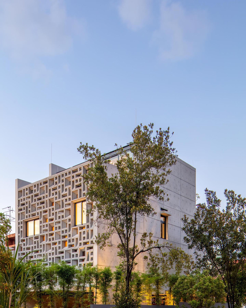 HYLA architects wraps singapore house in perforated screens of different patterns