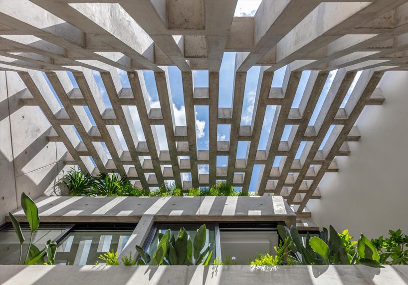 HYLA architects wraps singapore house in perforated screens of different patterns