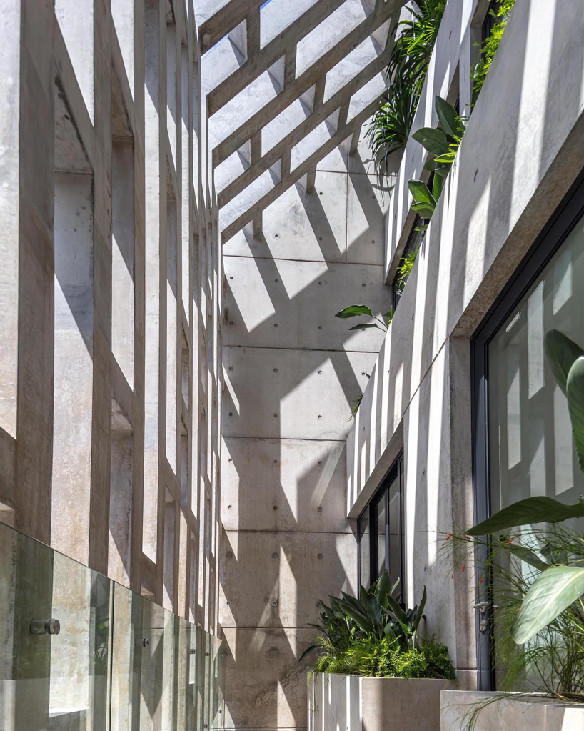 HYLA architects wraps singapore house in perforated screens of different patterns