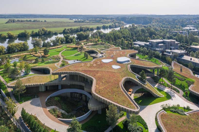 green roofs melt j.mayer.h's n.n. residence into the rolling hills of rural moscow designboom
