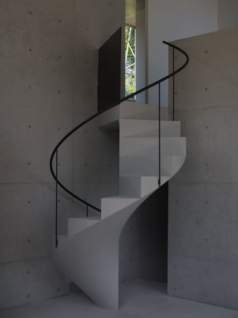 kazunori fujimoto architects completes house in ashiya, japan, with concrete spiral staircase