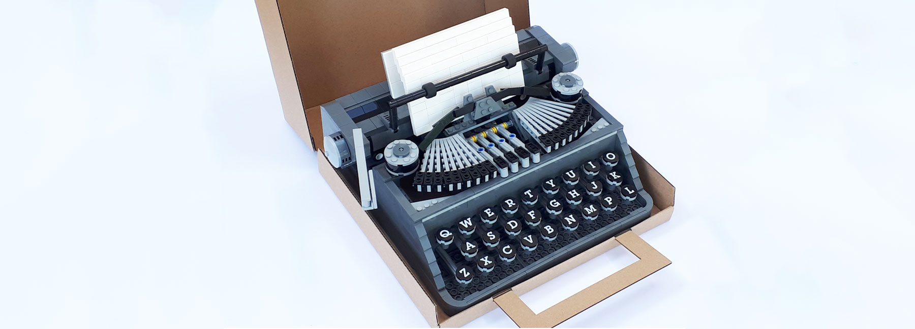 designer builds lifesize LEGO typewriter with working handcrank