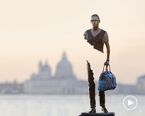 'incomplete' sculptures of travelers by bruno catalano dock in venice