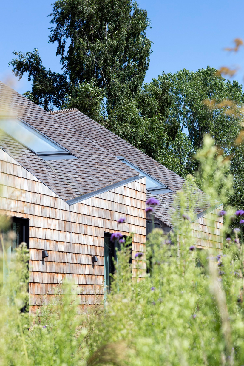 blee halligan architects extends five acre brick barn with shingle-clad B&B in the UK