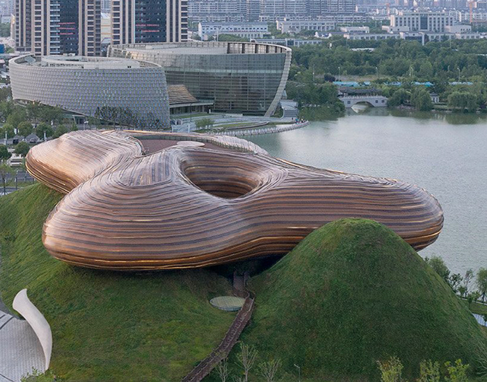 inspired by a chinese instrument, the sinuous shape is designed to ...