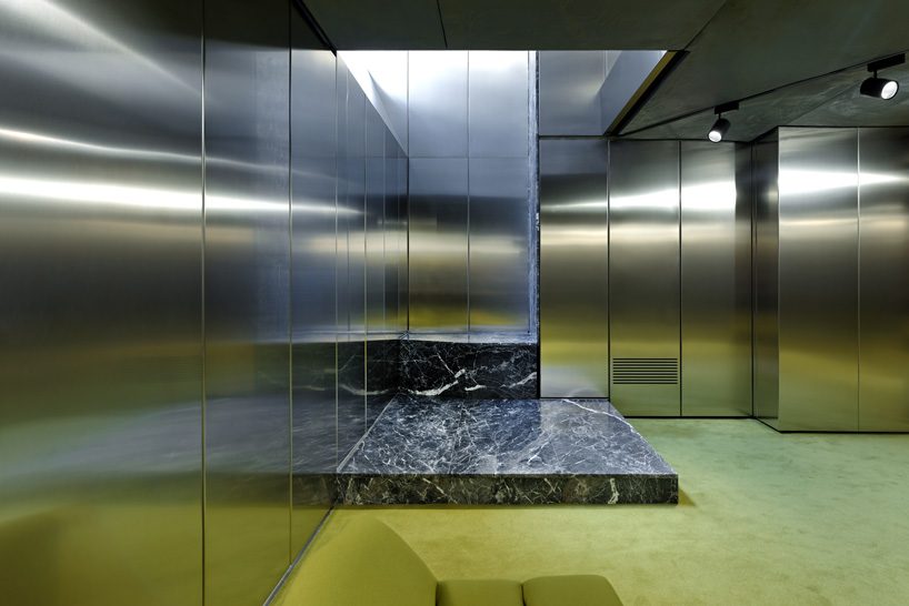 didier faustino mixes marble + steel within the enfants riches déprimés boutique in paris