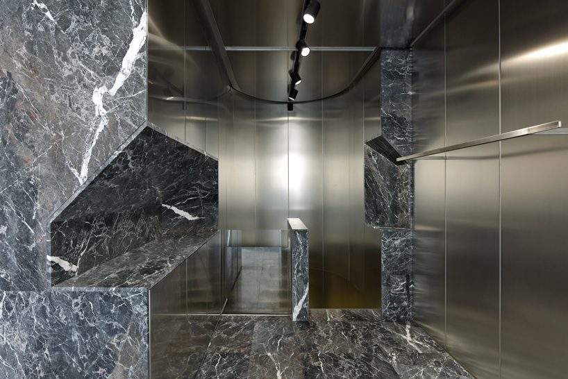 didier faustino mixes marble + steel within the enfants riches déprimés boutique in paris