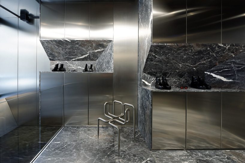 didier faustino mixes marble + steel within the enfants riches déprimés boutique in paris